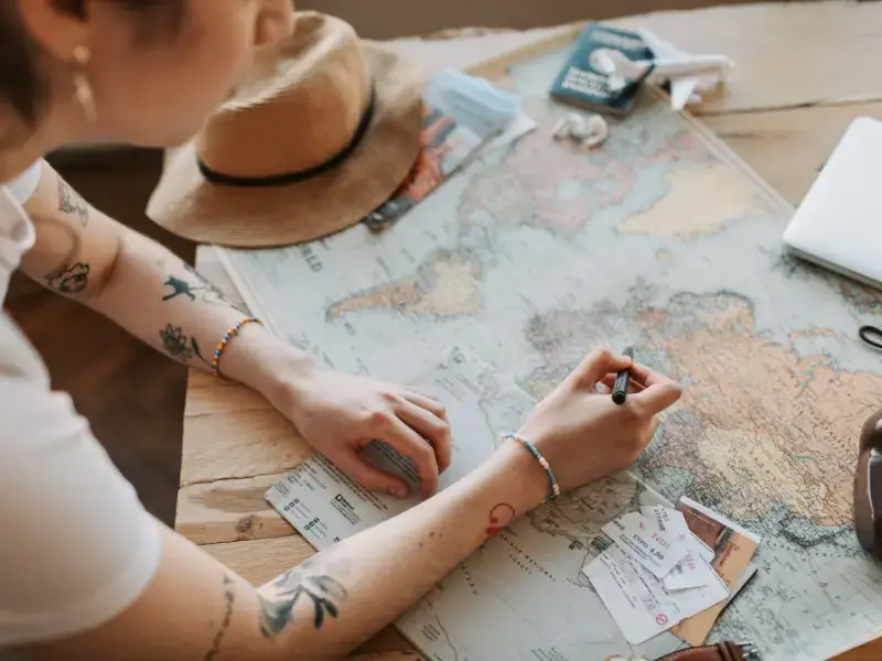 Woman comparing countries with digital nomad visa programs
